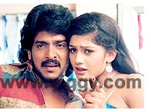 Upendra and Radhika in Auto Shankar