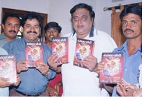 M.G. Lingaraj during his directory launch with actor Ambarish