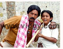 Ramya and Sudeep and Master Chandan in Nammanna