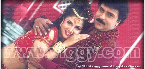 Rambha and Ravichandran in film Sahukara