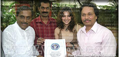 Music director Hamsalekha, producer Ramesh Yadav, actress Bhavana and director Baraguru